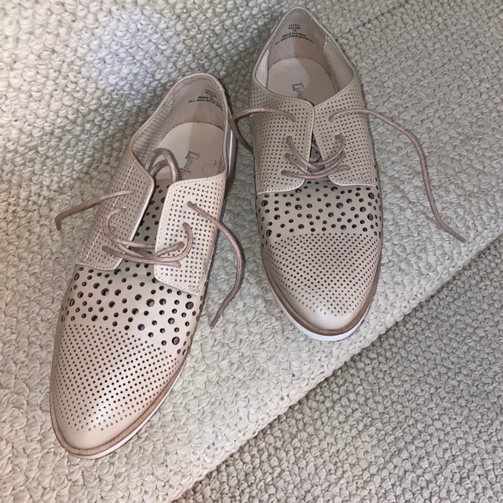 New tan oxford leather shoes.
